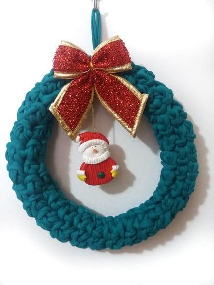 Guirlanda decorativa de natal , laço e boneco de neve