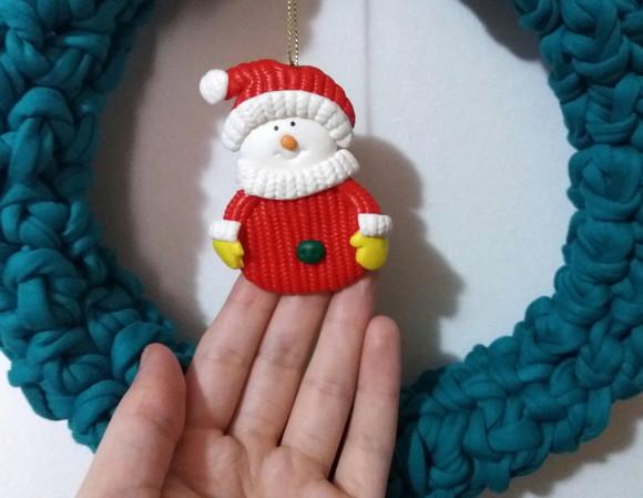 Guirlanda decorativa de natal , laço e boneco de neve