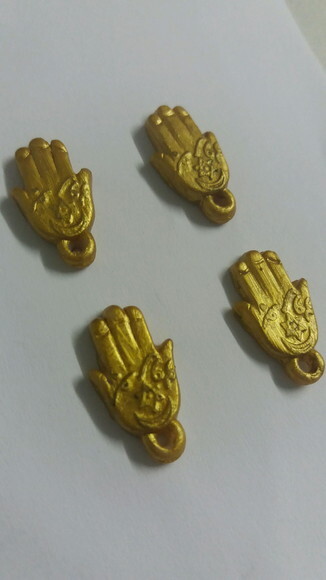 Hamsa pingente em biscuit
