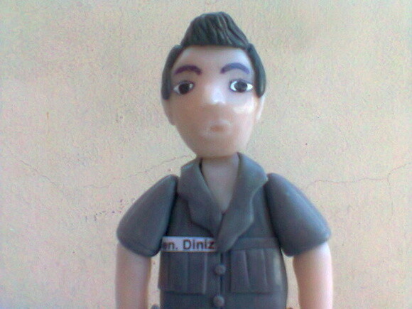 Topo de bolo policial com viatura