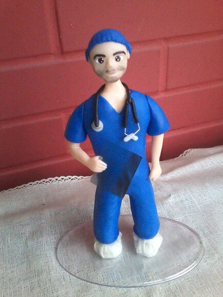 Boneco em biscuit radiologia/medicina