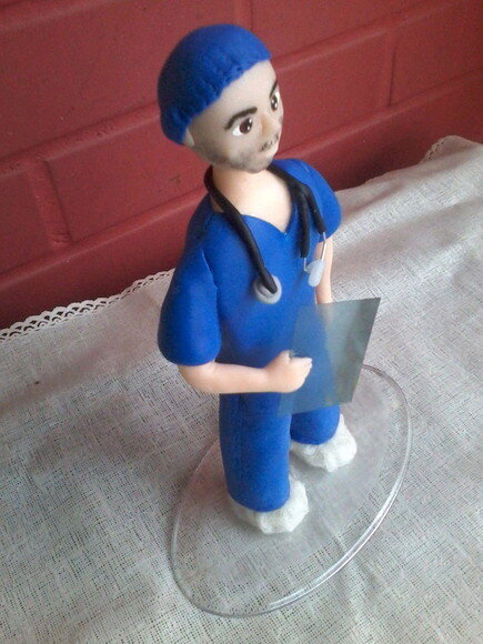 Boneco em biscuit radiologia/medicina