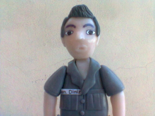 Topo de bolo policial com viatura