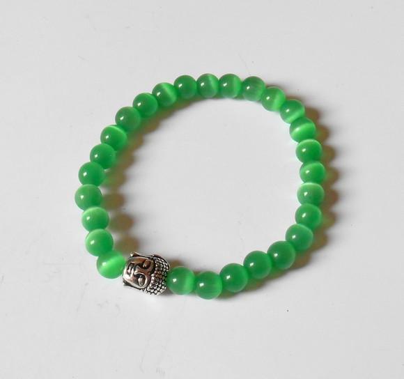 Pulseira Japamala com olho gato verde 27 contas