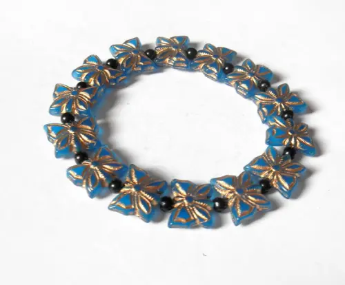 Pulseira borboletas Theca azul com dourado