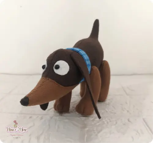 Cachorro Sizzles de Feltro