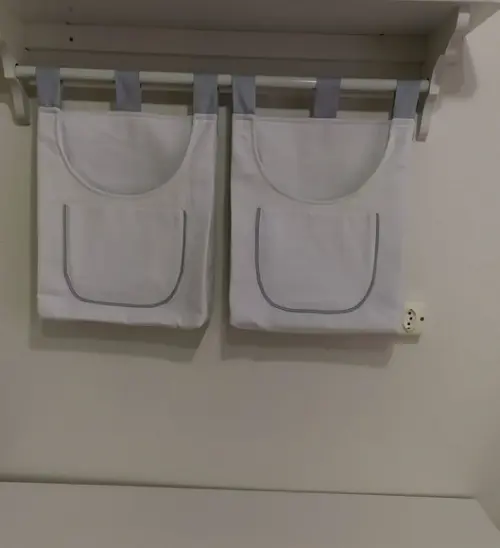Bolsões Porta Fraldas em Piquet Branco com Bolsinhos