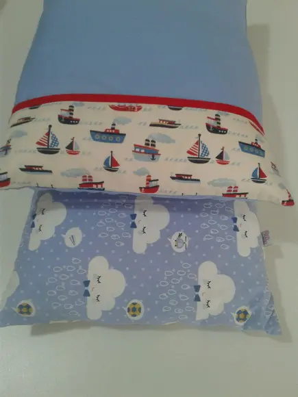 Fronha e travesseiro para bebe