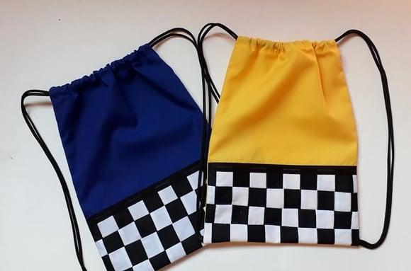 Lembrancinha Mochilinha Mcqueen Bandeira Quadriculada
