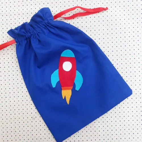 10 Saquinhos de Tecido Azul Festa Astronauta Foguete