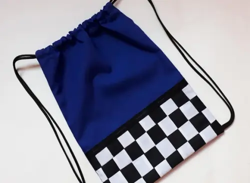 Lembrancinha Mochilinha Mcqueen Bandeira Quadriculada