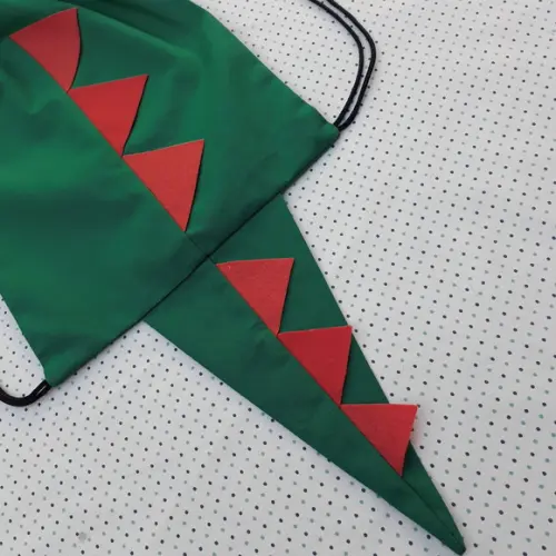 Mochilinha Dinossauro verde com laranja