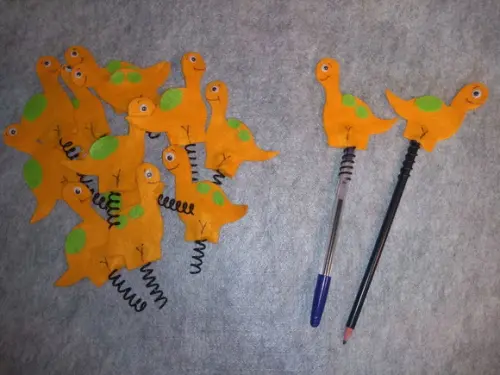 Ponteiras dinossauros em feltro