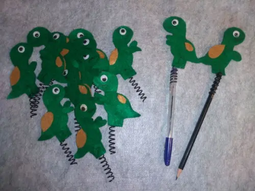 Ponteiras dinossauros em feltro