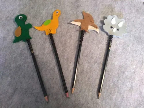 Ponteiras dinossauros em feltro