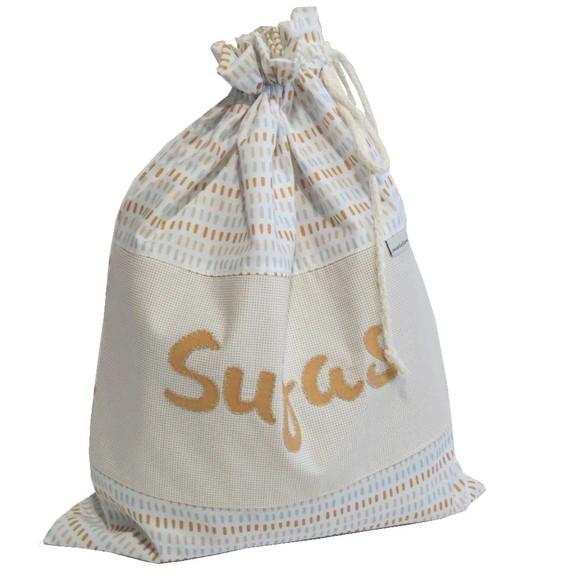 Saco roupa impermeável bordado