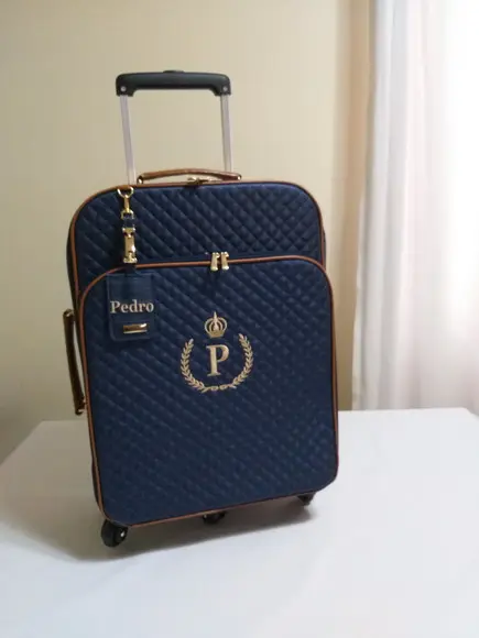 Mala de rodinha, bolsa passeio G e porta documentos