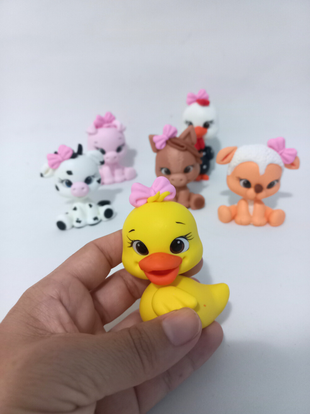 Aplique fazendinha Rosa em biscuit