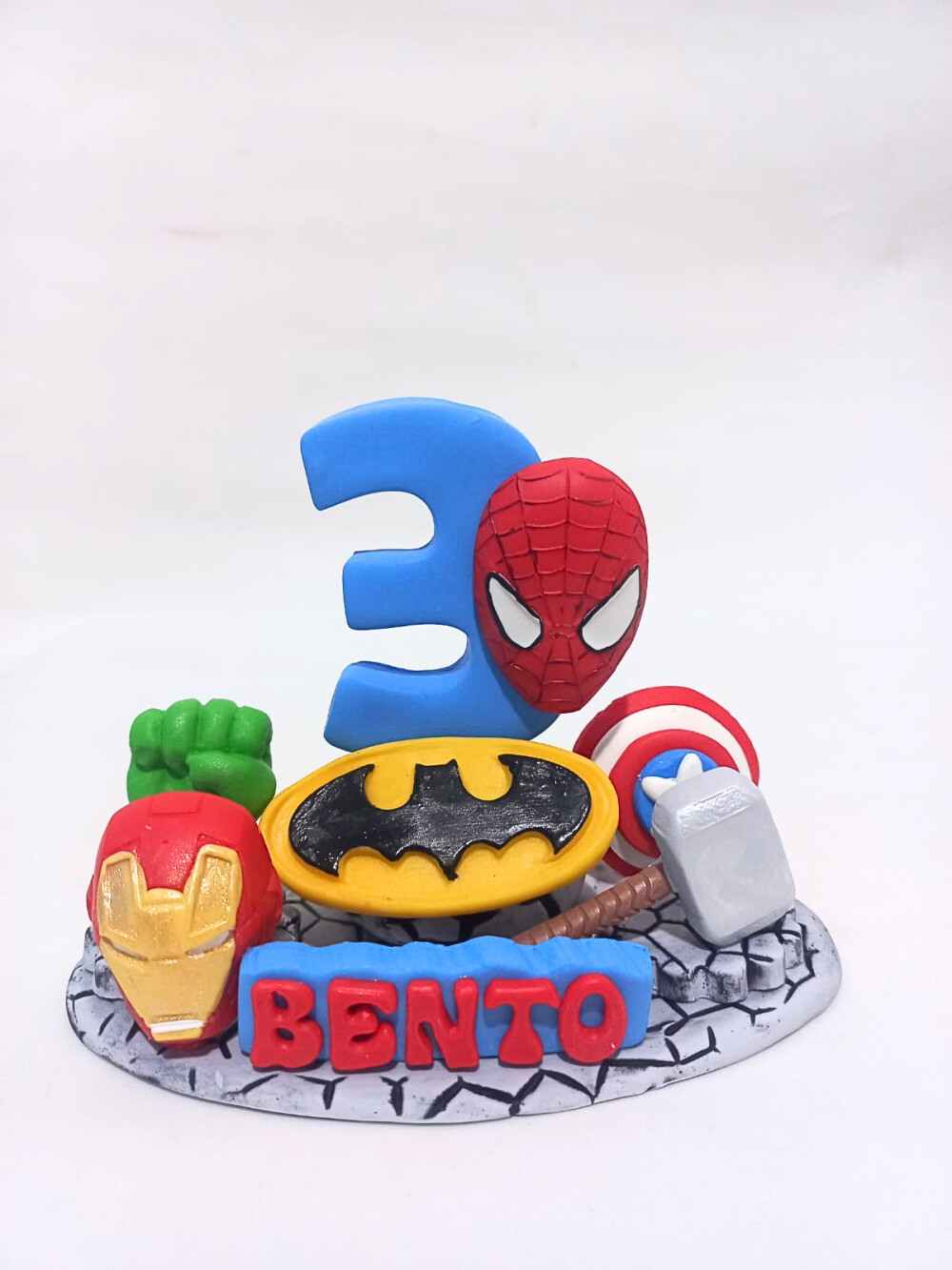 Vela Heróis em Biscuit