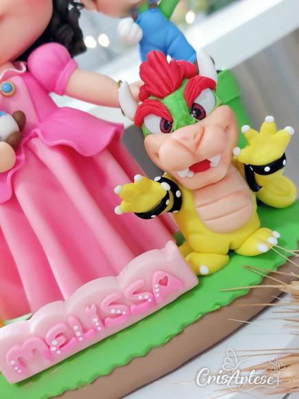 Topo de Bolo com Vela Super Mario