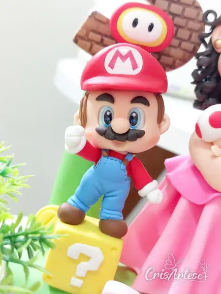 Topo de Bolo com Vela Super Mario