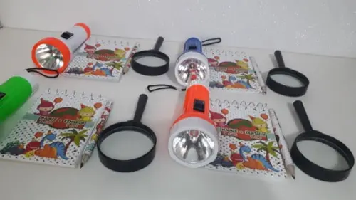 Kit Bloquinho + Mini Lápis + Lanterna + Lupa Dinossauro