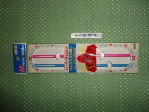 Passador de elásticos, fitas e cordões