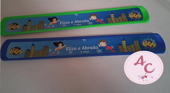 25 Pulseiras Bate Enrola Super Herois