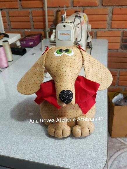Cachorro peso de porta.