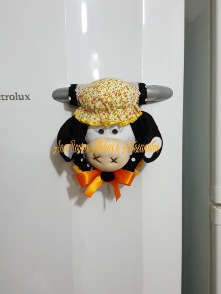 Puxador de geladeira.