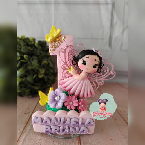 Topo, vela em biscuit tema jardim encantado