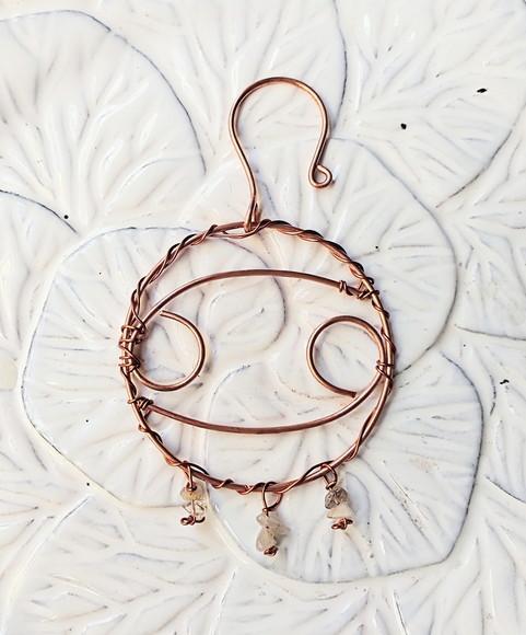 Símbolo do Signo Câncer em cobre e pedras naturais