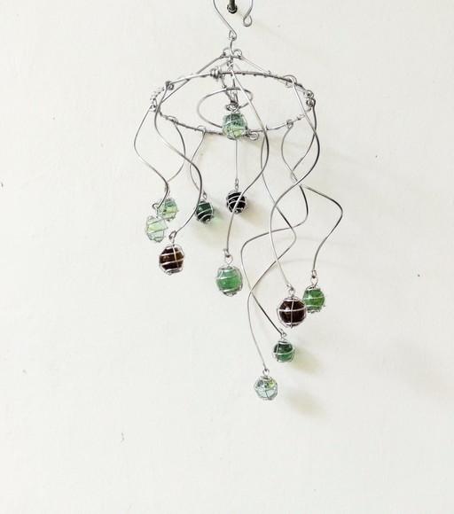 Suncatcher Turbilhão em tons de verde e âmbar