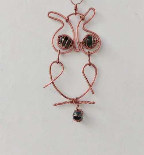 Suncatcher Corujinha articulada em cobre