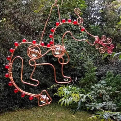 Suncatcher Dragão em cobre e tons vermelhos