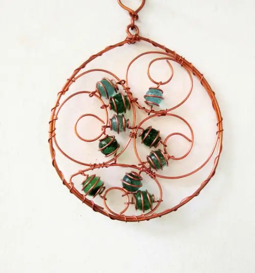 Suncatcher Mandala 1 em cobre e tons de verde