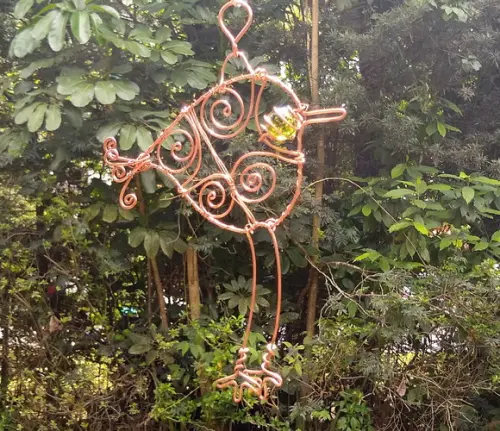 Suncatcher Pássaro Pernudo em fios de cobre