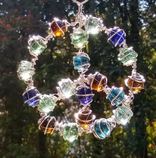 Suncatcher Paz e Amor P multicolorido