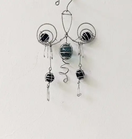 Suncatcher Oriental em Alumínio