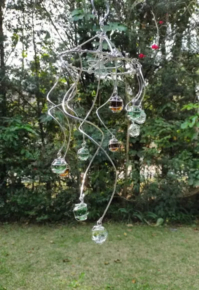 Suncatcher Turbilhão em tons de verde e âmbar