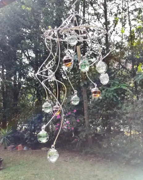 Suncatcher Turbilhão em tons de verde e âmbar