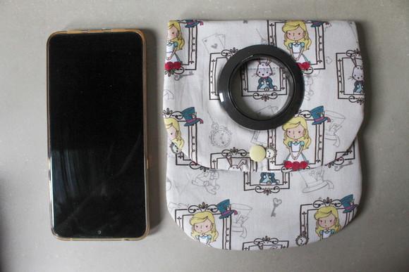 Porta carregador/celular Alice