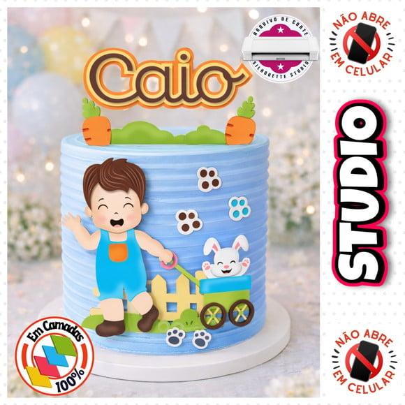 Arquivo Topo de Bolo Páscoa Menino Puxando Carrinho Coelho