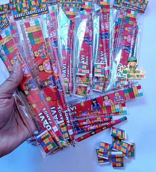 25 Kits Lápis, Régua e Borracha Lego