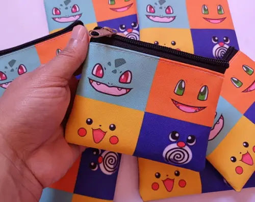 35 Porta Moedas Pokémon Tamanho: 10x12cm