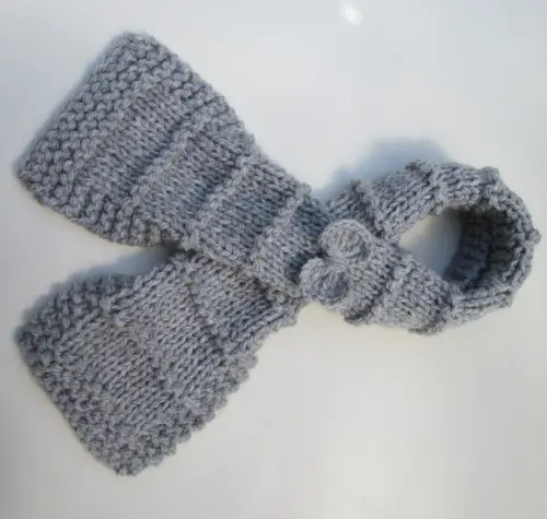 Cachecol e Gorro Infantil em Trico com Laço-  cor Cinza- feito ?