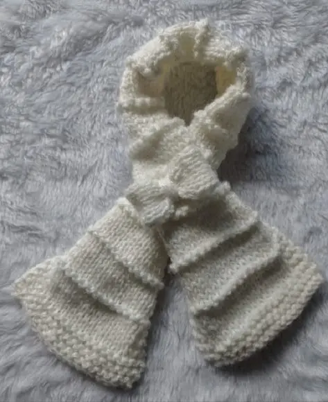 Cachecol infantil em tricô com laço - cor natural
