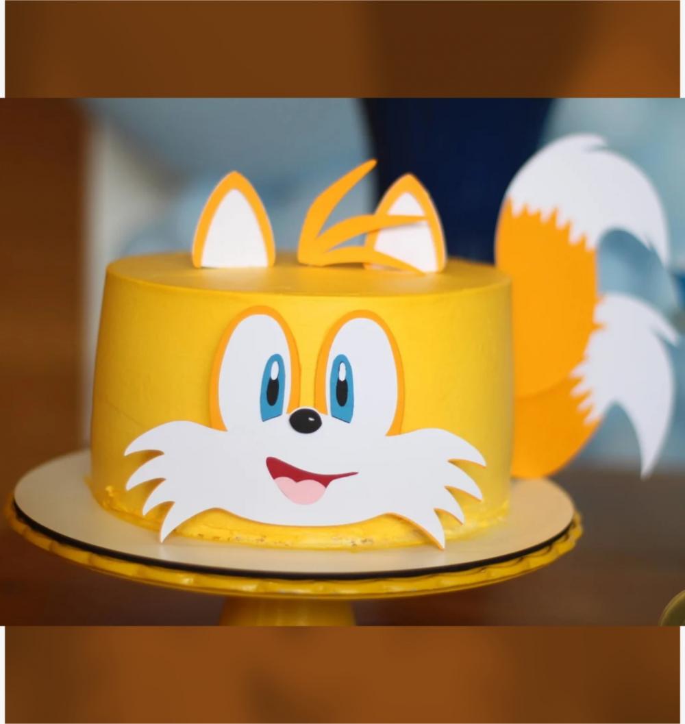 topo de bolo tails