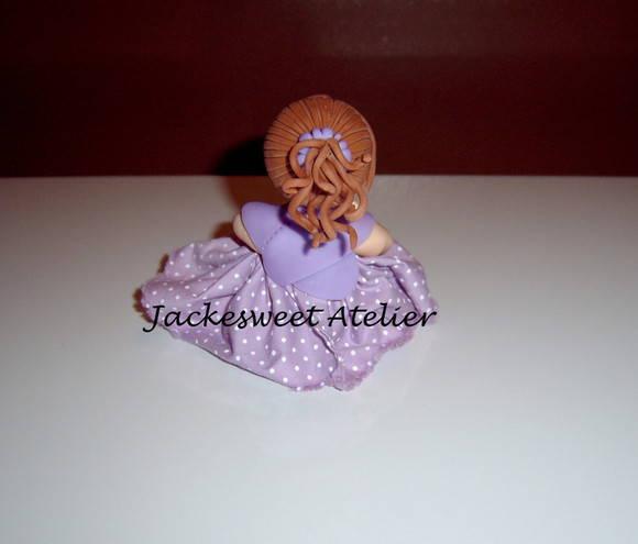 Boneca de vestido em biscuit