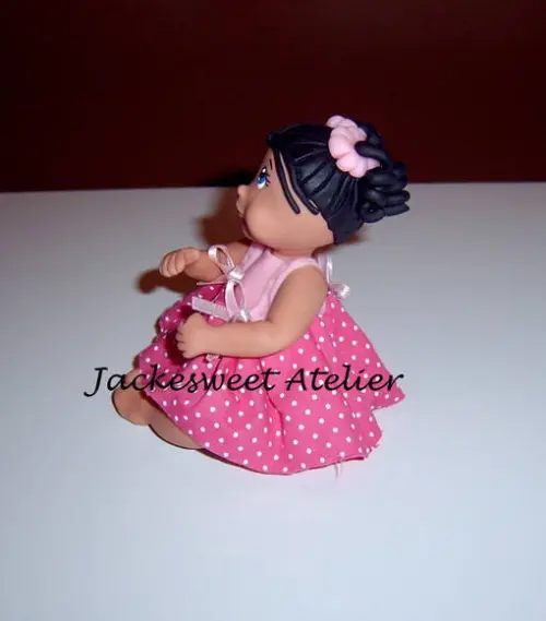 Boneca de vestido em biscuit